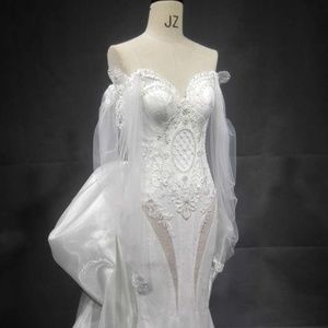 Darius Couture long sleeve wedding dresses